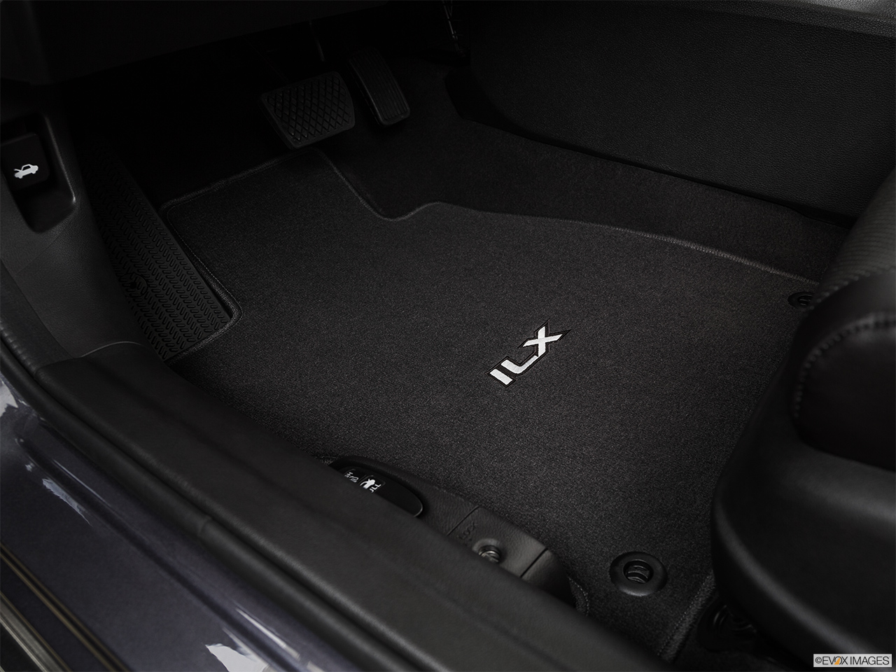 2015 Acura ILX 5-Speed Automatic Driver's floor mat and pedals. Mid-seat level from outside looking in. 