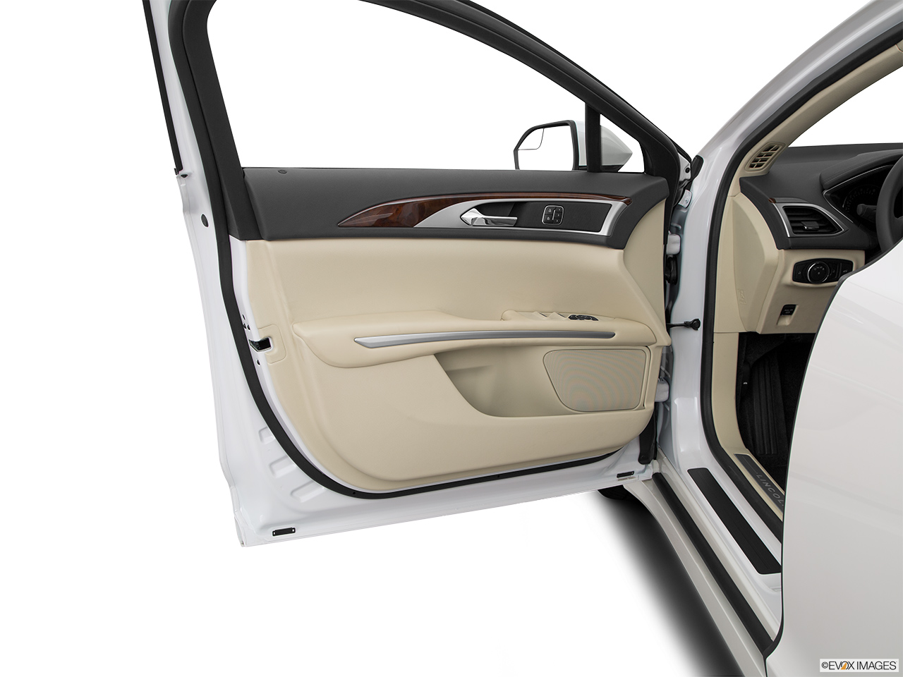 2015 Lincoln MKZ Base Inside of driver's side open door, window open. 