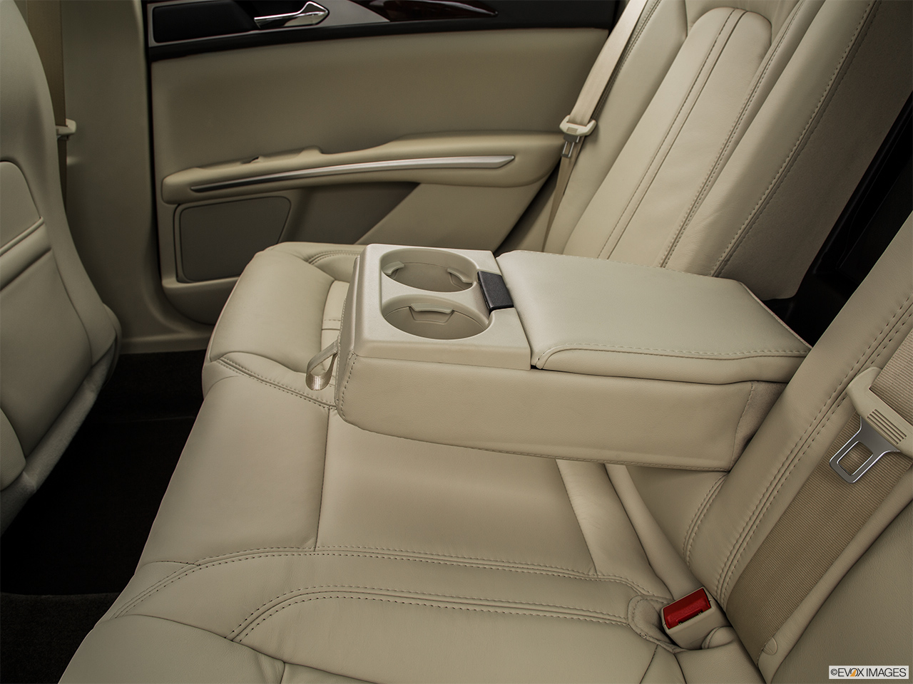 2015 Lincoln MKZ Base Rear center console with closed lid from driver's side looking down. 