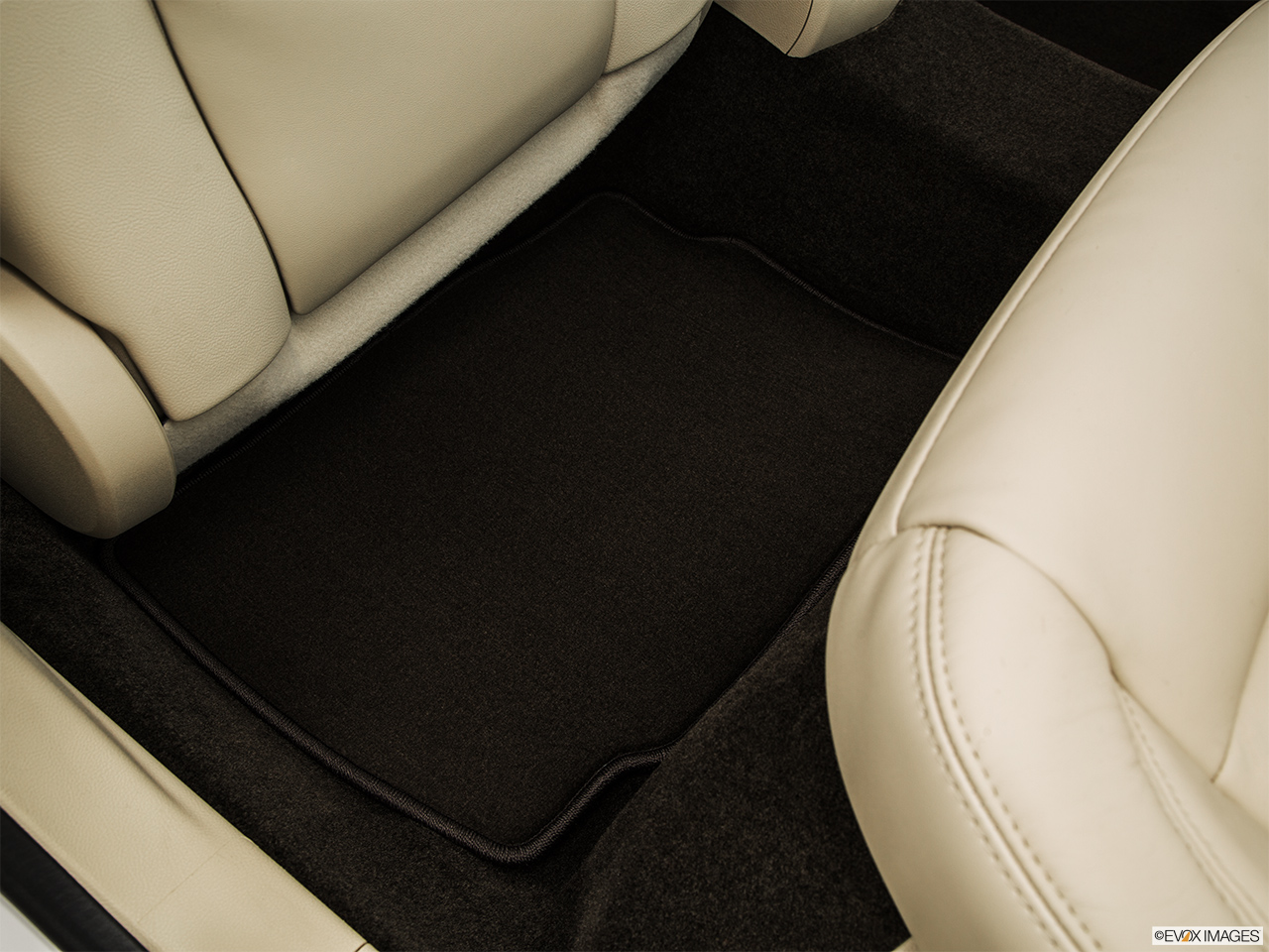 2015 Lincoln MKZ Base Rear driver's side floor mat. Mid-seat level from outside looking in. 