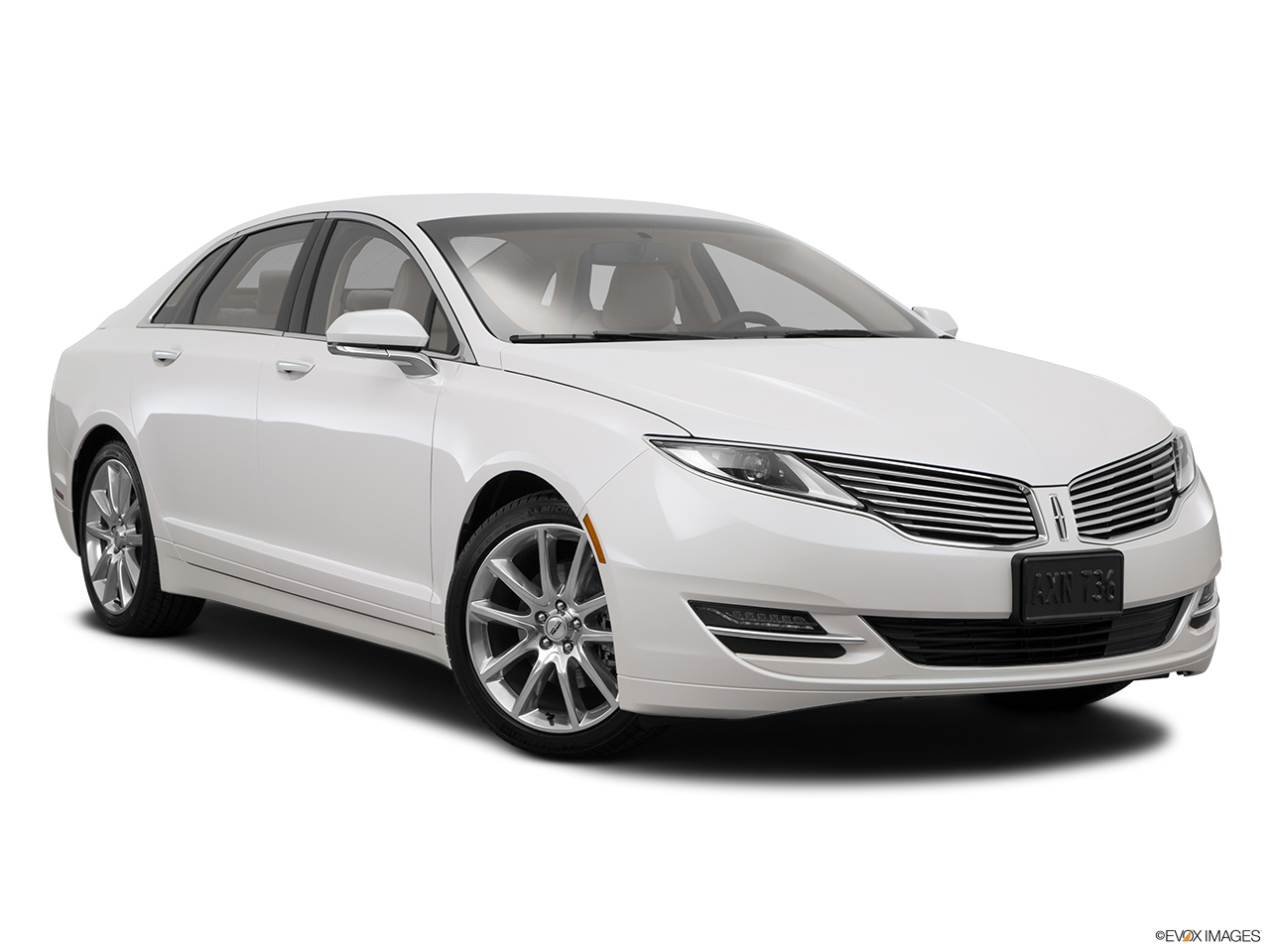 2015 Lincoln MKZ Base Front passenger 3/4 w/ wheels turned. 