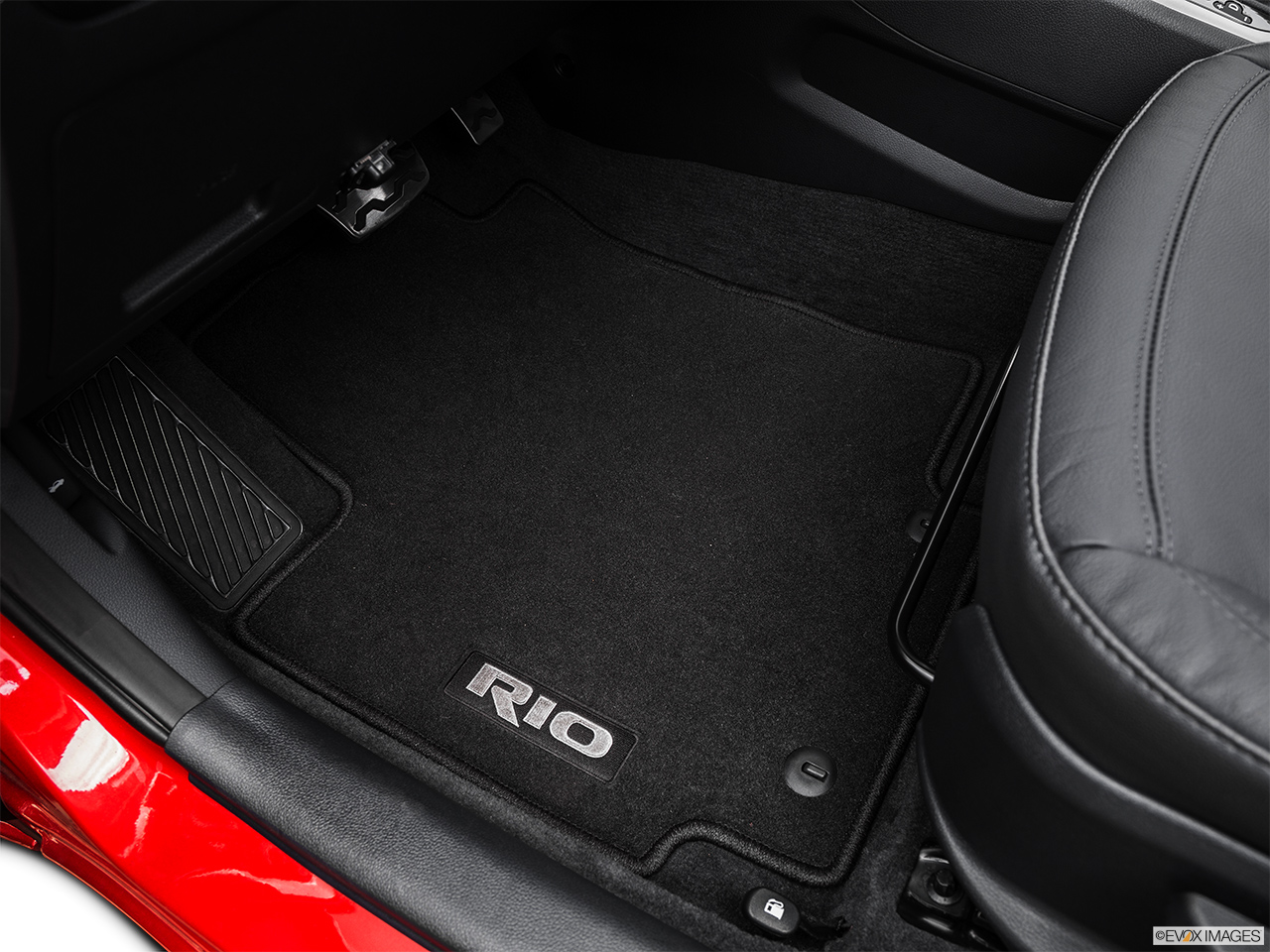 2015 Kia Rio 5-door SX Driver's floor mat and pedals. Mid-seat level from outside looking in. 