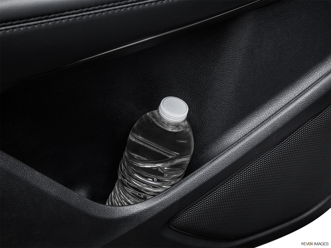2015 Lincoln MKC Base Second row side cup holder with coffee prop, or second row door cup holder with water bottle. 