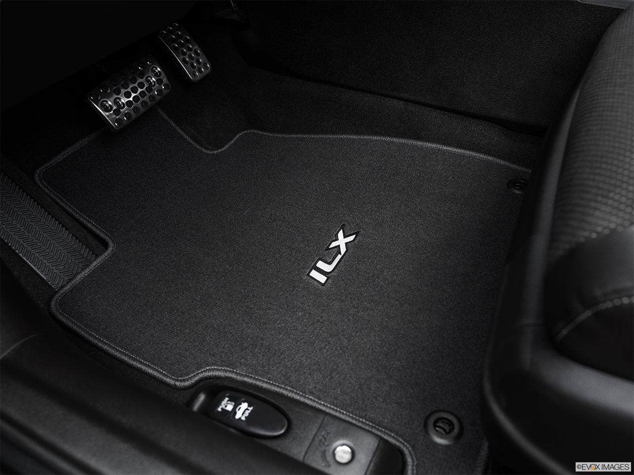 2016 Acura ILX Technology Plus and A-Spec Package Driver's floor mat and pedals. Mid-seat level from outside looking in. 