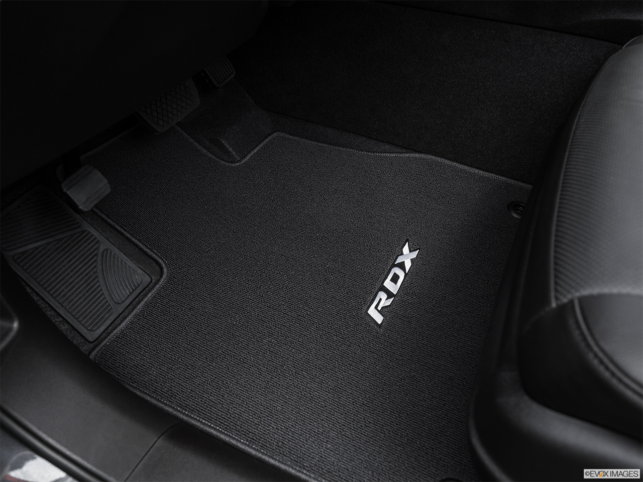 2016 Acura RDX Base Driver's floor mat and pedals. Mid-seat level from outside looking in. 