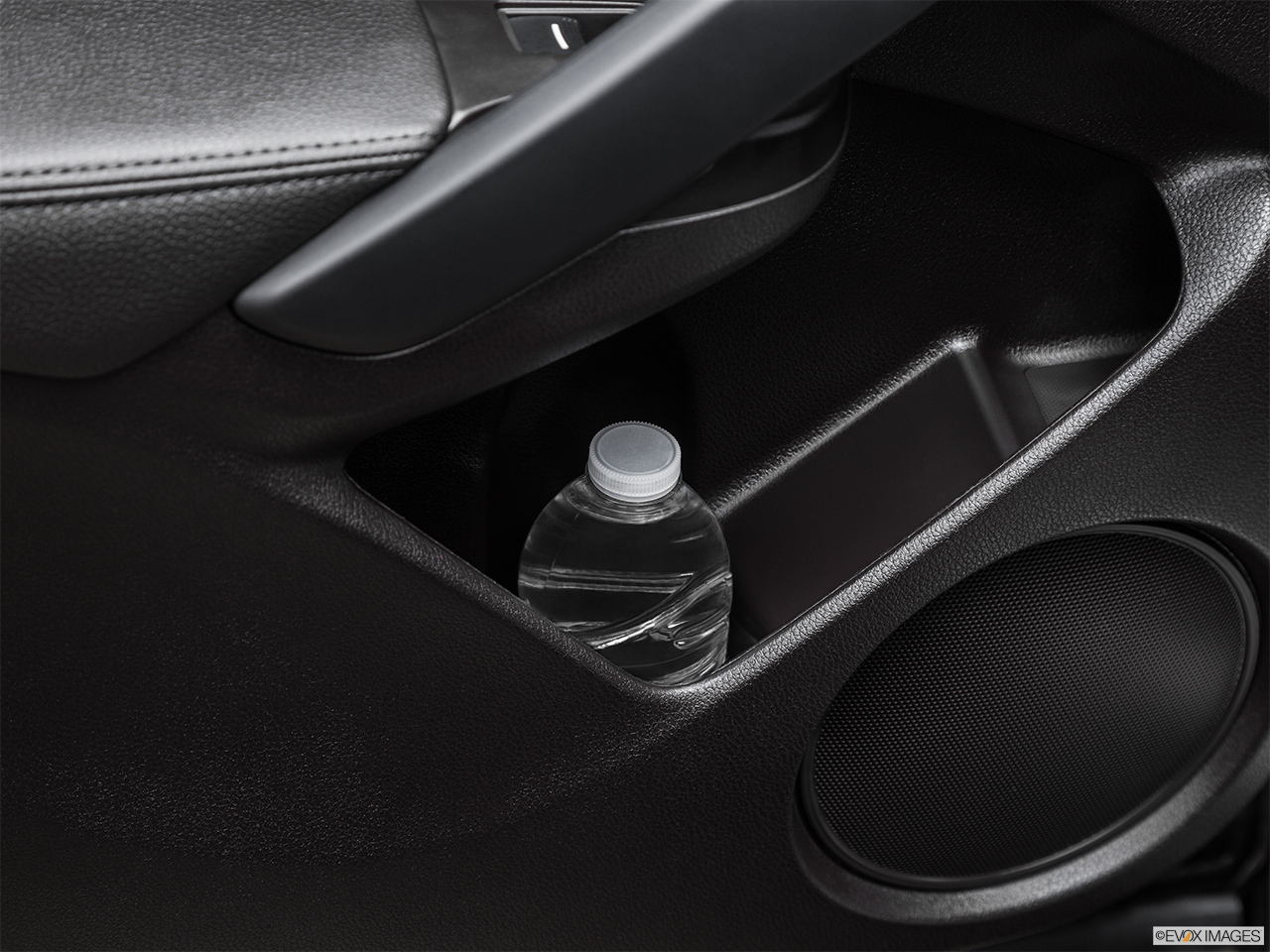 2016 Acura RDX Base Second row side cup holder with coffee prop, or second row door cup holder with water bottle. 