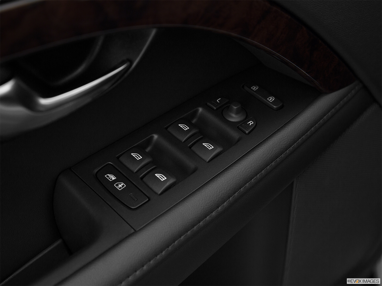 2016 Volvo XC70 T5 AWD Premier Driver's side inside window controls. 
