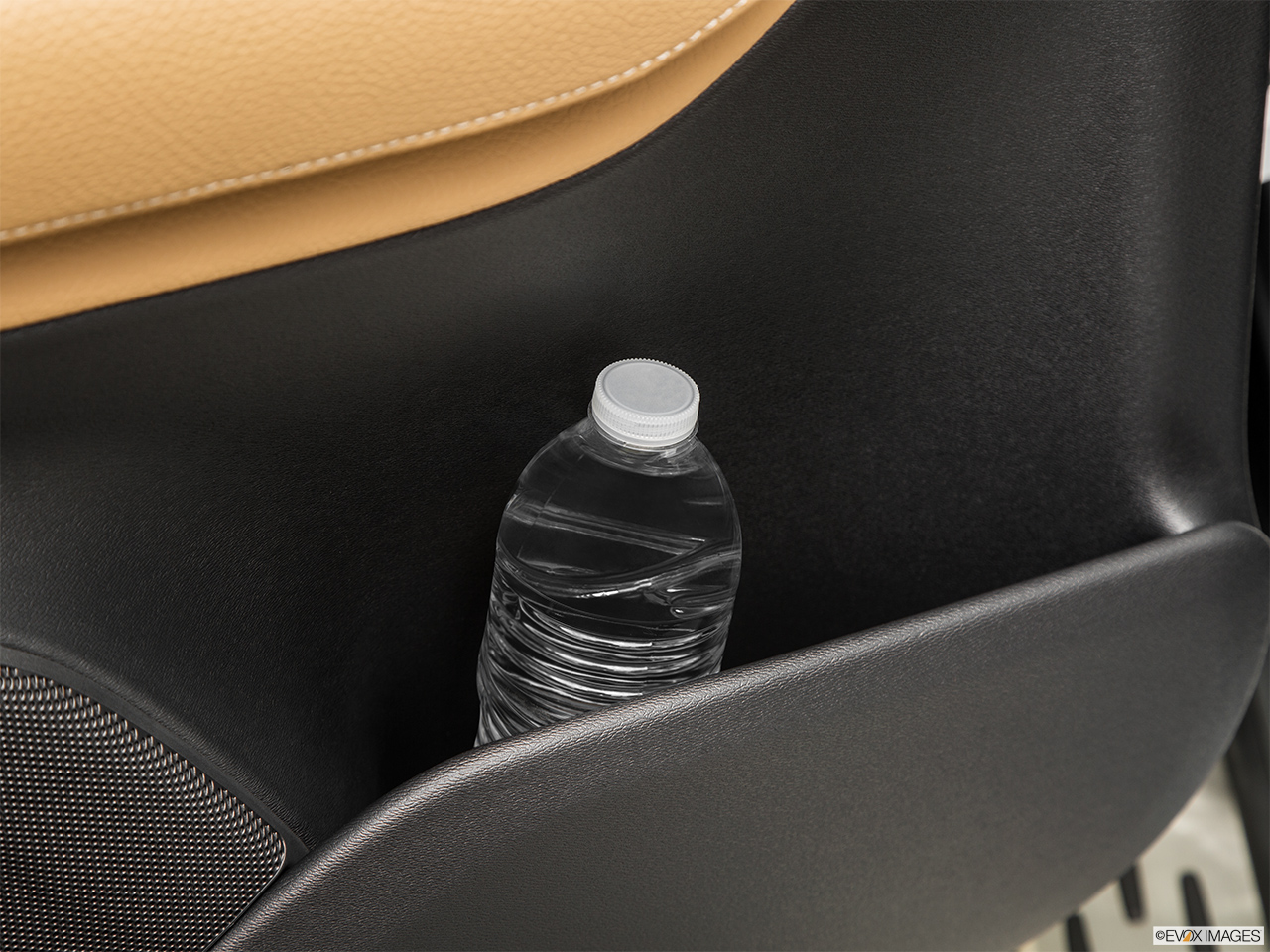2016 Volvo XC90 T6 AWD Second row side cup holder with coffee prop, or second row door cup holder with water bottle. 