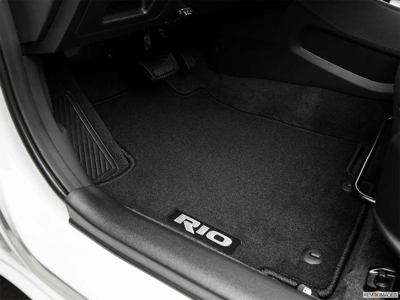 2016 Kia Rio 5-door LX Driver's floor mat and pedals. Mid-seat level from outside looking in. 