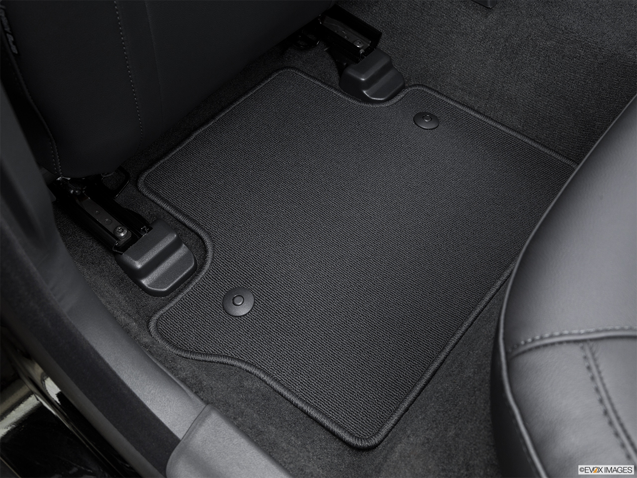 2016 Volvo S80 T5 Drive-E FWD Rear driver's side floor mat. Mid-seat level from outside looking in. 