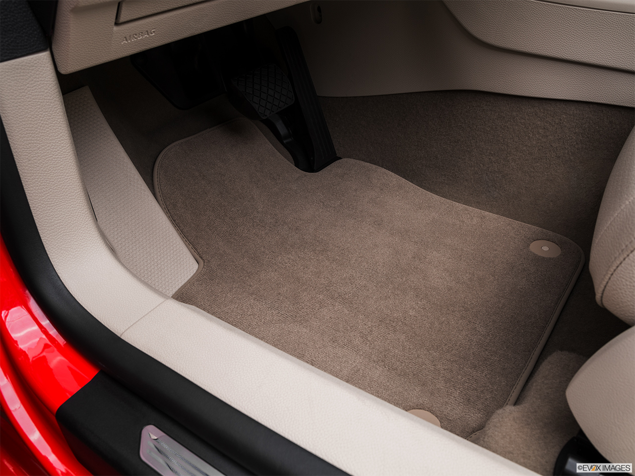 2016 Volkswagen Eos Komfort Edition Driver's floor mat and pedals. Mid-seat level from outside looking in. 