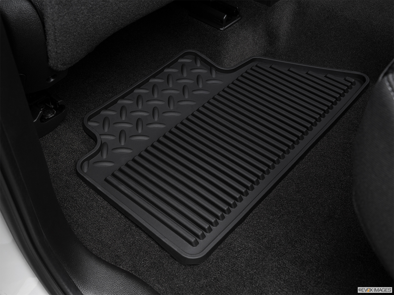 2016 GMC Sierra 2500HD SLE Rear driver's side floor mat. Mid-seat level from outside looking in. 