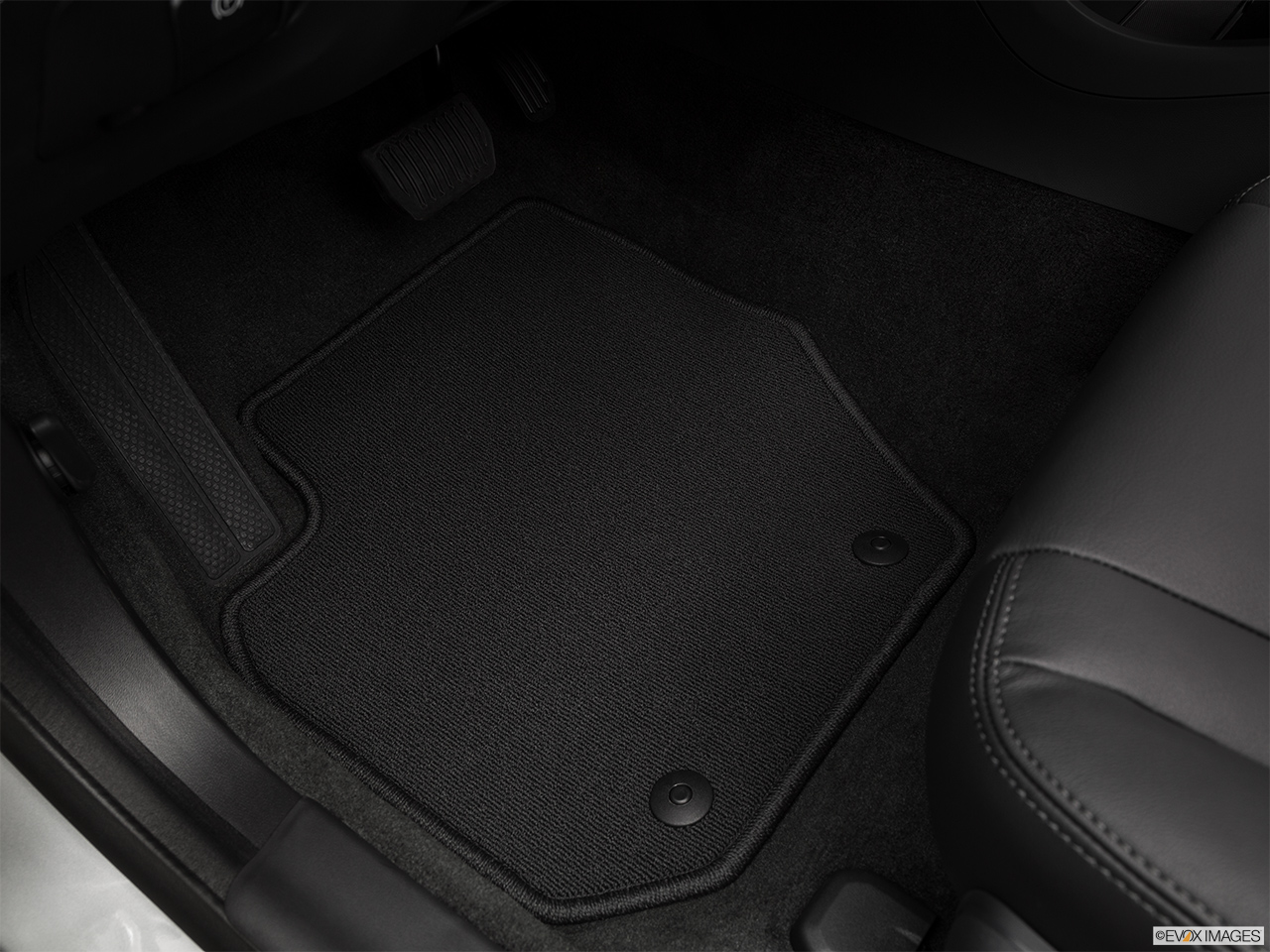 2016 Volvo V60 T5 Drive-E FWD Premier Driver's floor mat and pedals. Mid-seat level from outside looking in. 