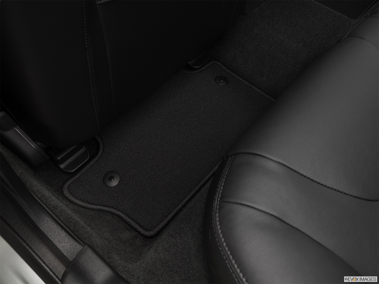 2016 Volvo V60 T5 Drive-E FWD Premier Rear driver's side floor mat. Mid-seat level from outside looking in. 