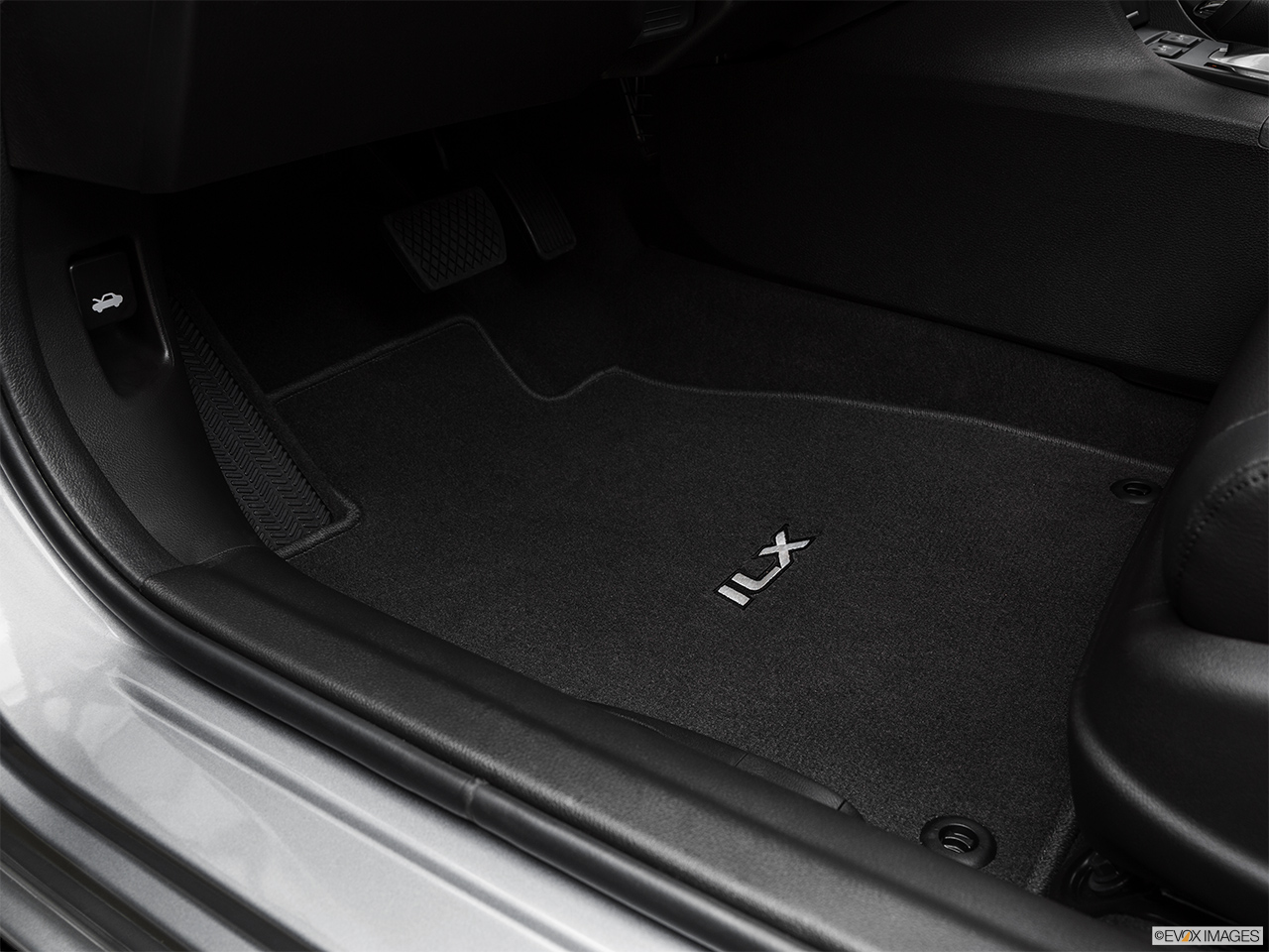 2017 Acura ILX Base Driver's floor mat and pedals. Mid-seat level from outside looking in. 
