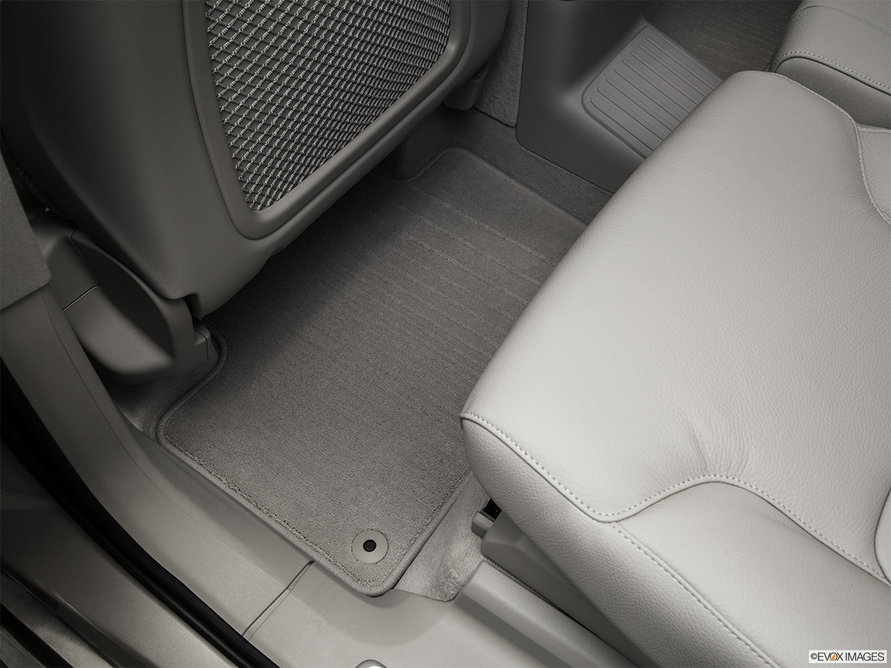 2016 Volvo XC90 Hybrid T8 Momentum Rear driver's side floor mat. Mid-seat level from outside looking in. 