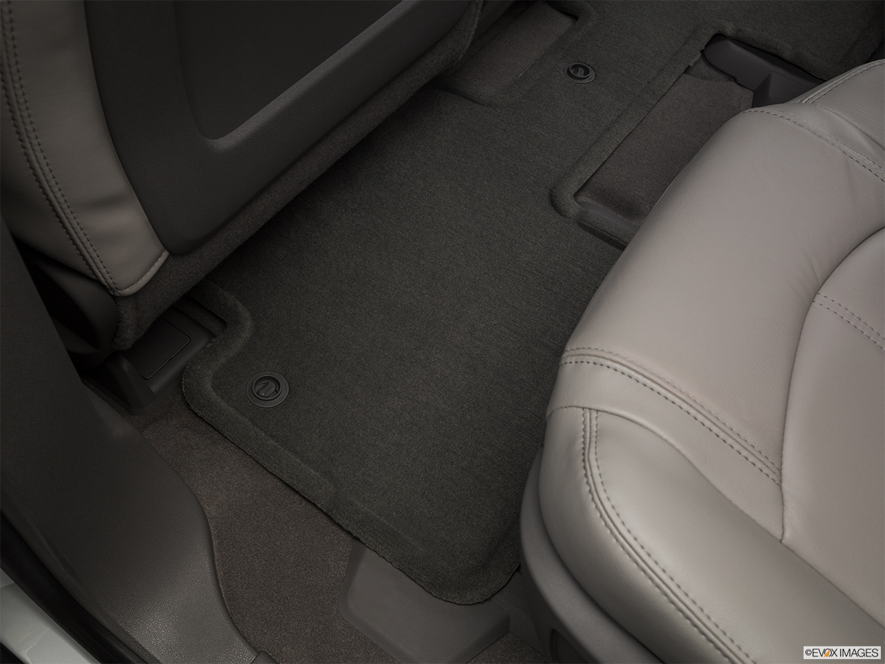 2017 GMC Acadia Limited SLT Rear driver's side floor mat. Mid-seat level from outside looking in. 