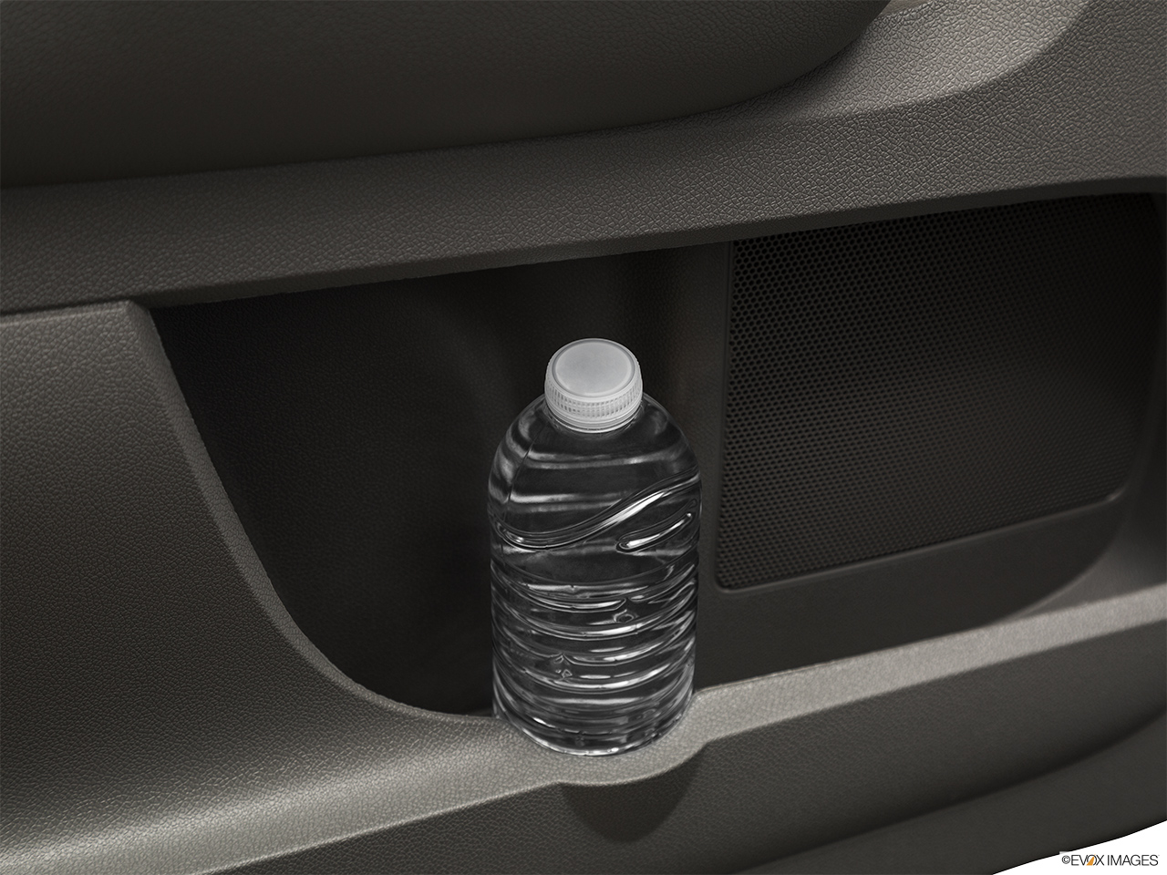 2017 GMC Acadia Limited SLT Second row side cup holder with coffee prop, or second row door cup holder with water bottle. 