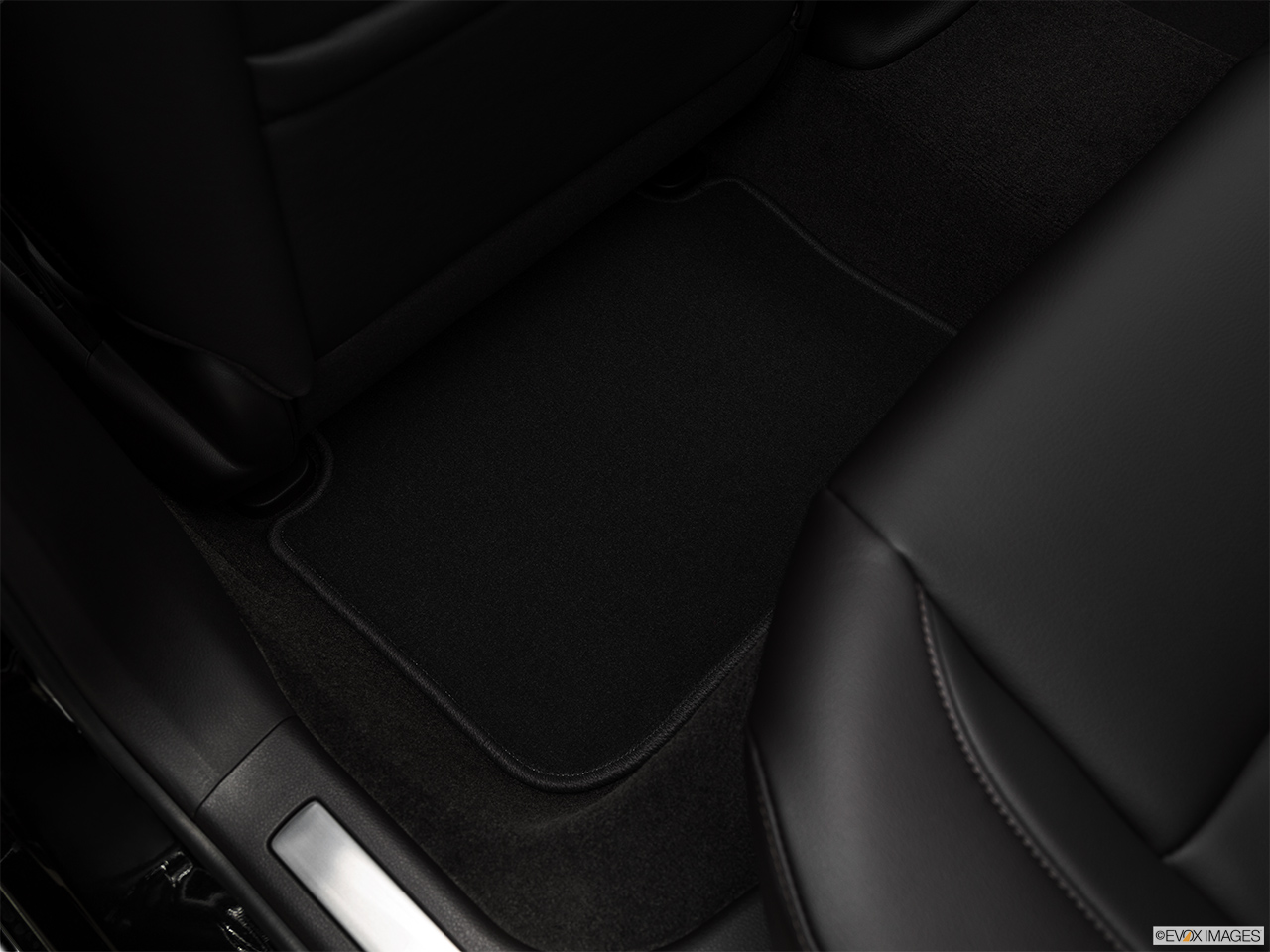 2017 Acura TLX Base Rear driver's side floor mat. Mid-seat level from outside looking in. 