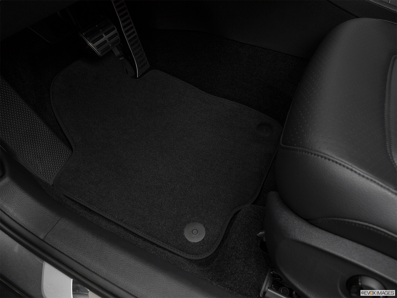 2018 Volkswagen Passat R-Line Driver's floor mat and pedals. Mid-seat level from outside looking in. 