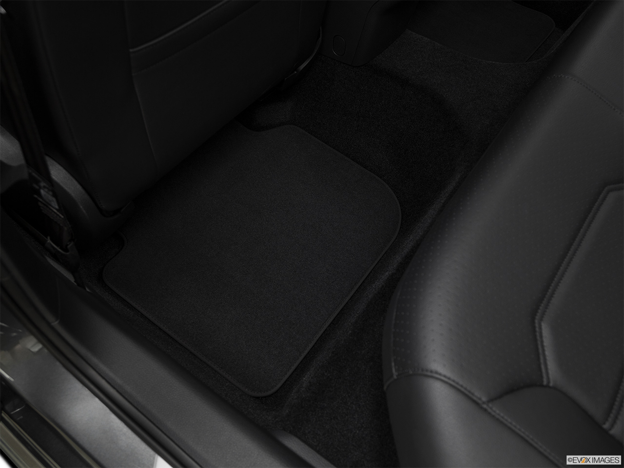 2018 Volkswagen Passat R-Line Rear driver's side floor mat. Mid-seat level from outside looking in. 