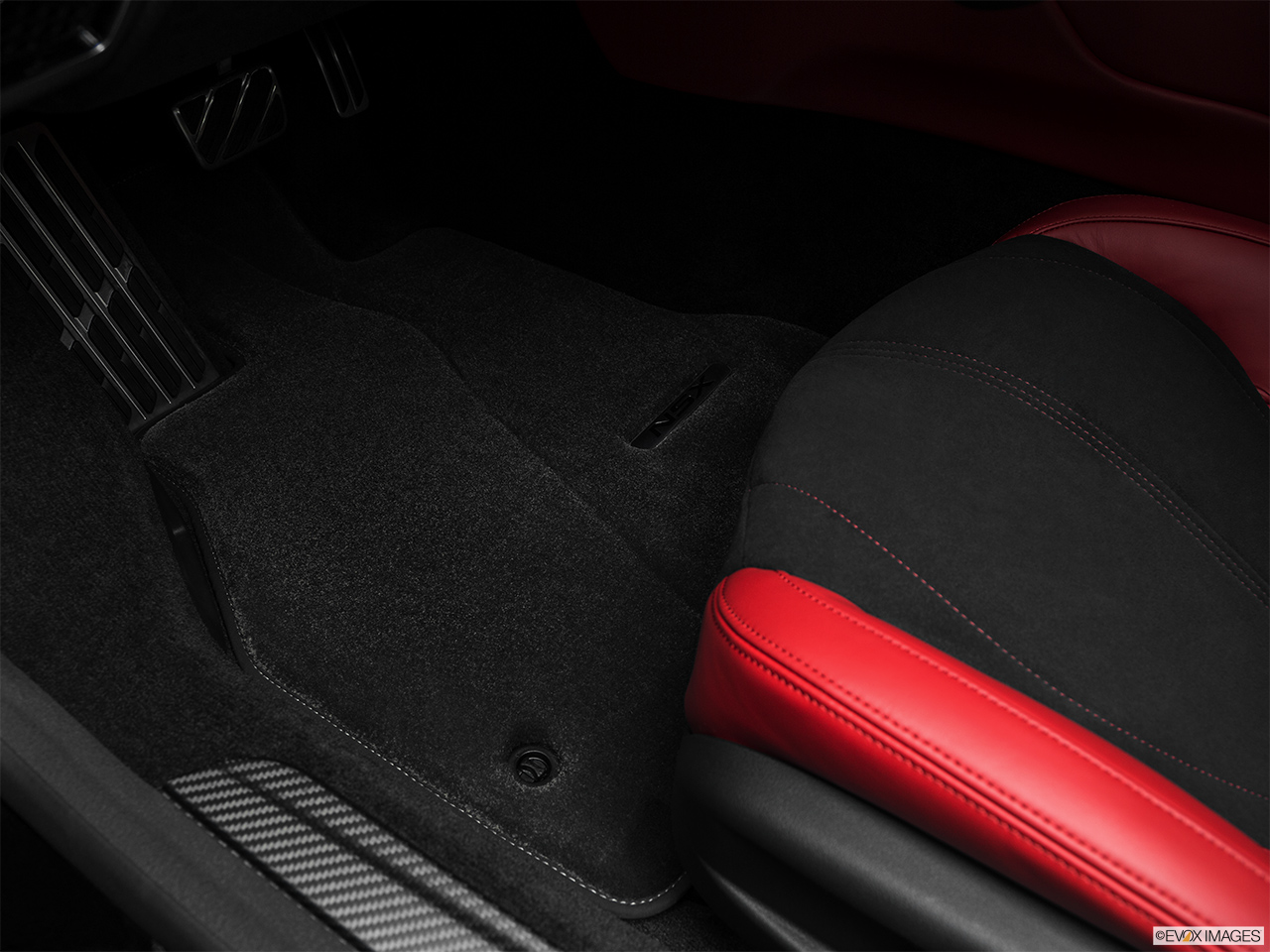 2018 Acura NSX Base Driver's floor mat and pedals. Mid-seat level from outside looking in. 