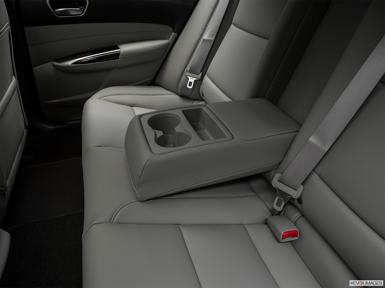 2019 Acura TLX 2.4 8-DCT P-AWS Rear center console with closed lid from driver's side looking down. 