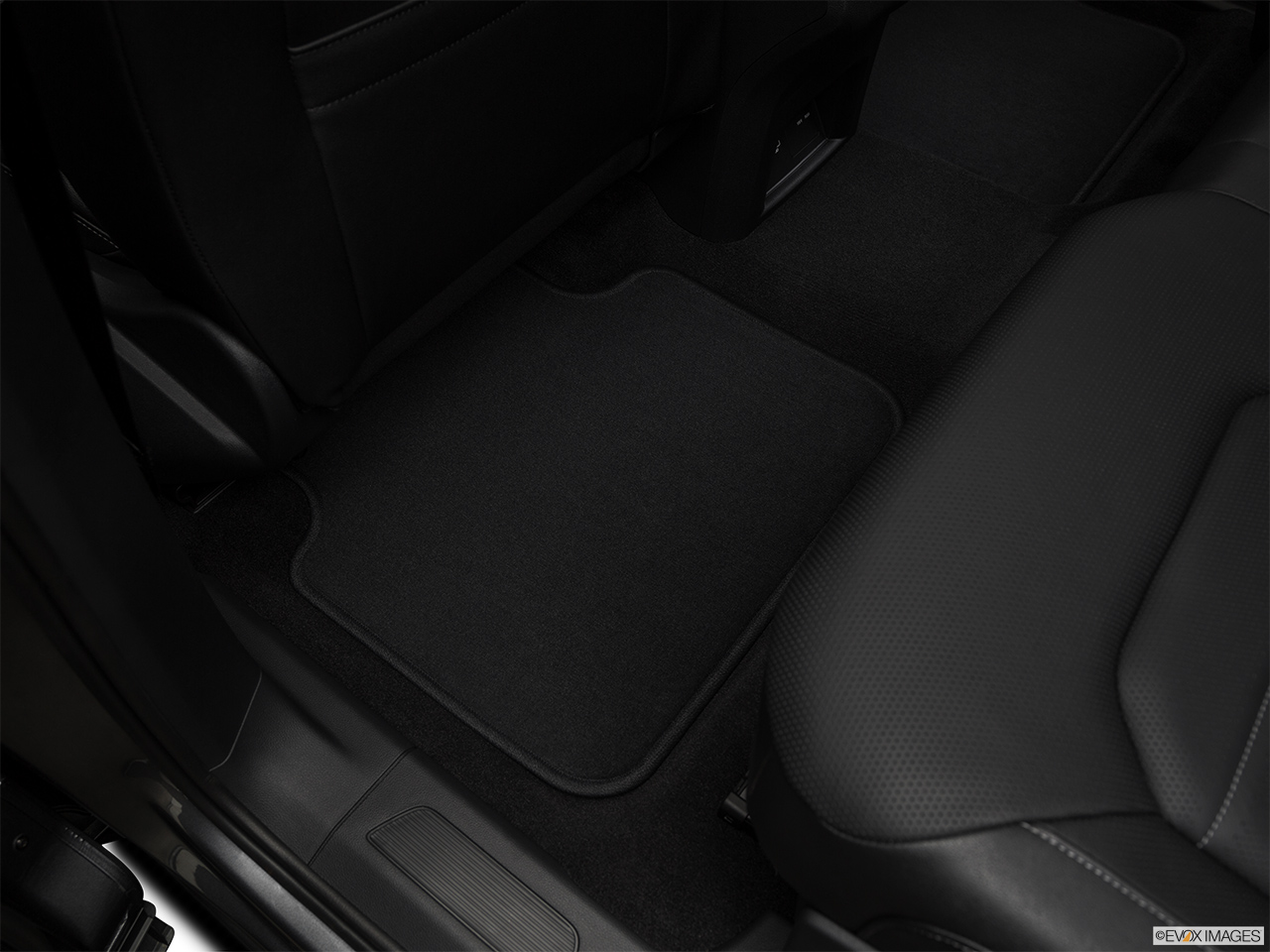 2018 Volkswagen Atlas SEL Premium Rear driver's side floor mat. Mid-seat level from outside looking in. 