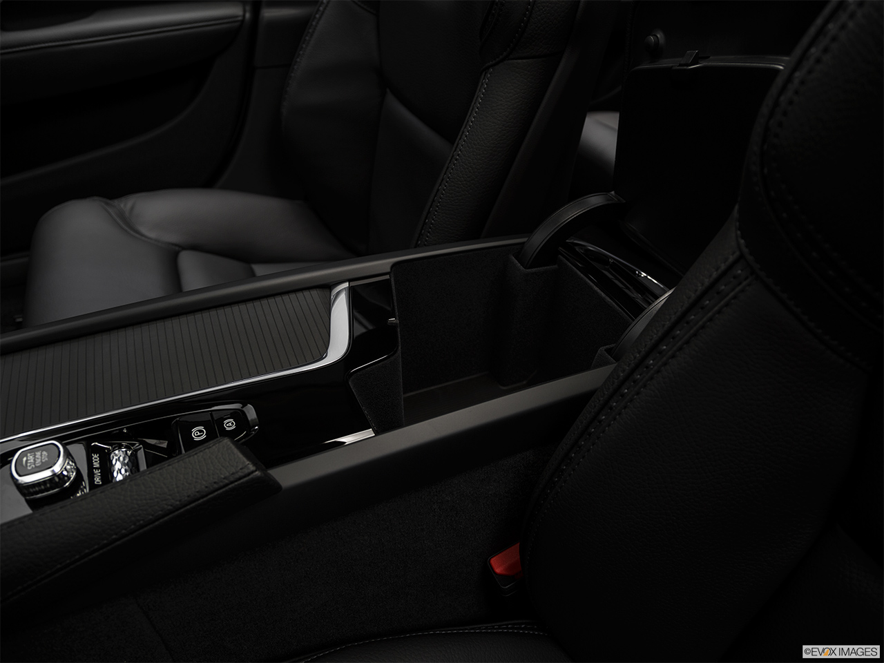 2019 Volvo V90 Cross Country T5 Front center console with closed lid, from driver's side looking down 