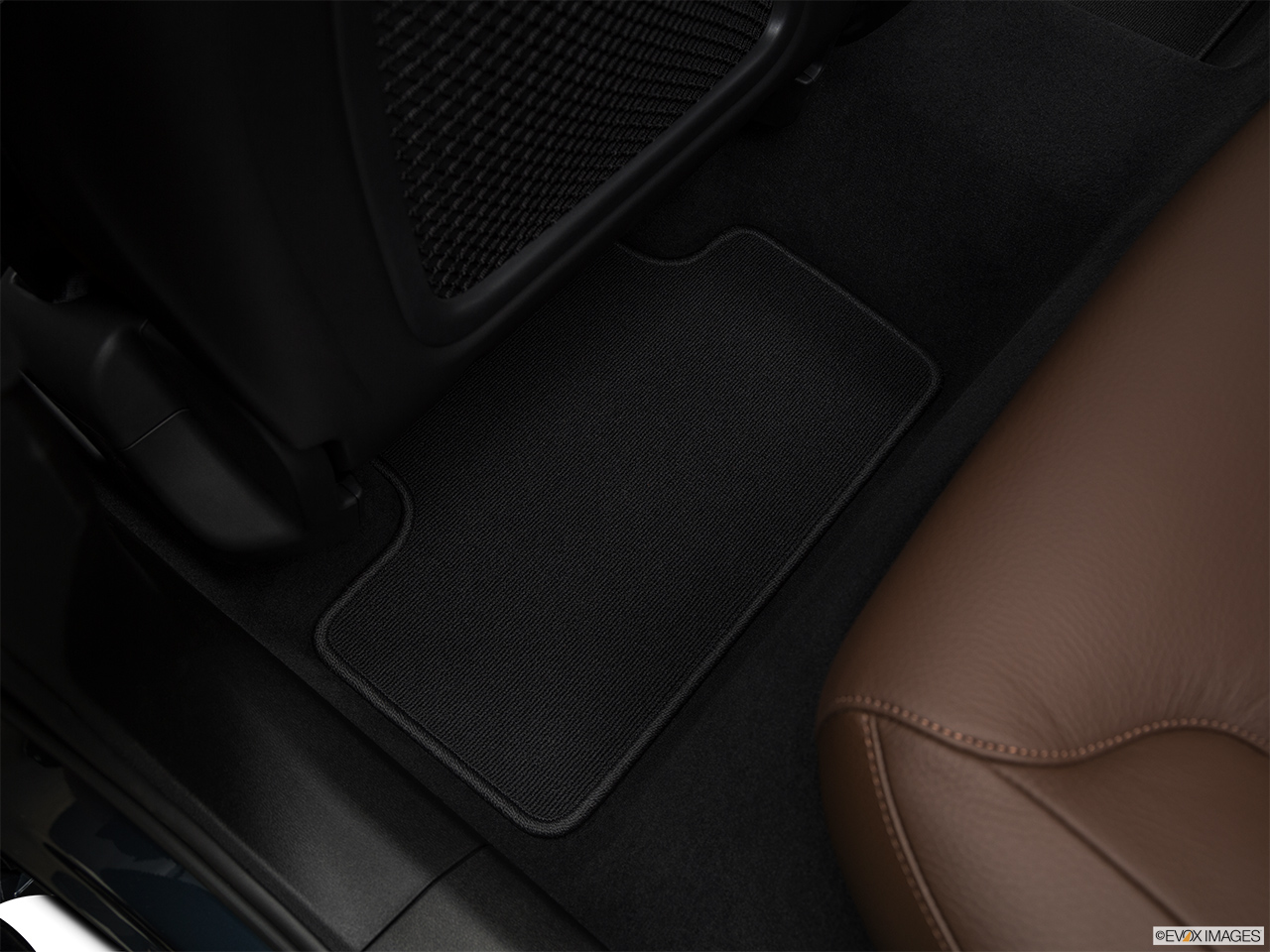 2018 Volvo XC60 T5 Momentum Rear driver's side floor mat. Mid-seat level from outside looking in. 