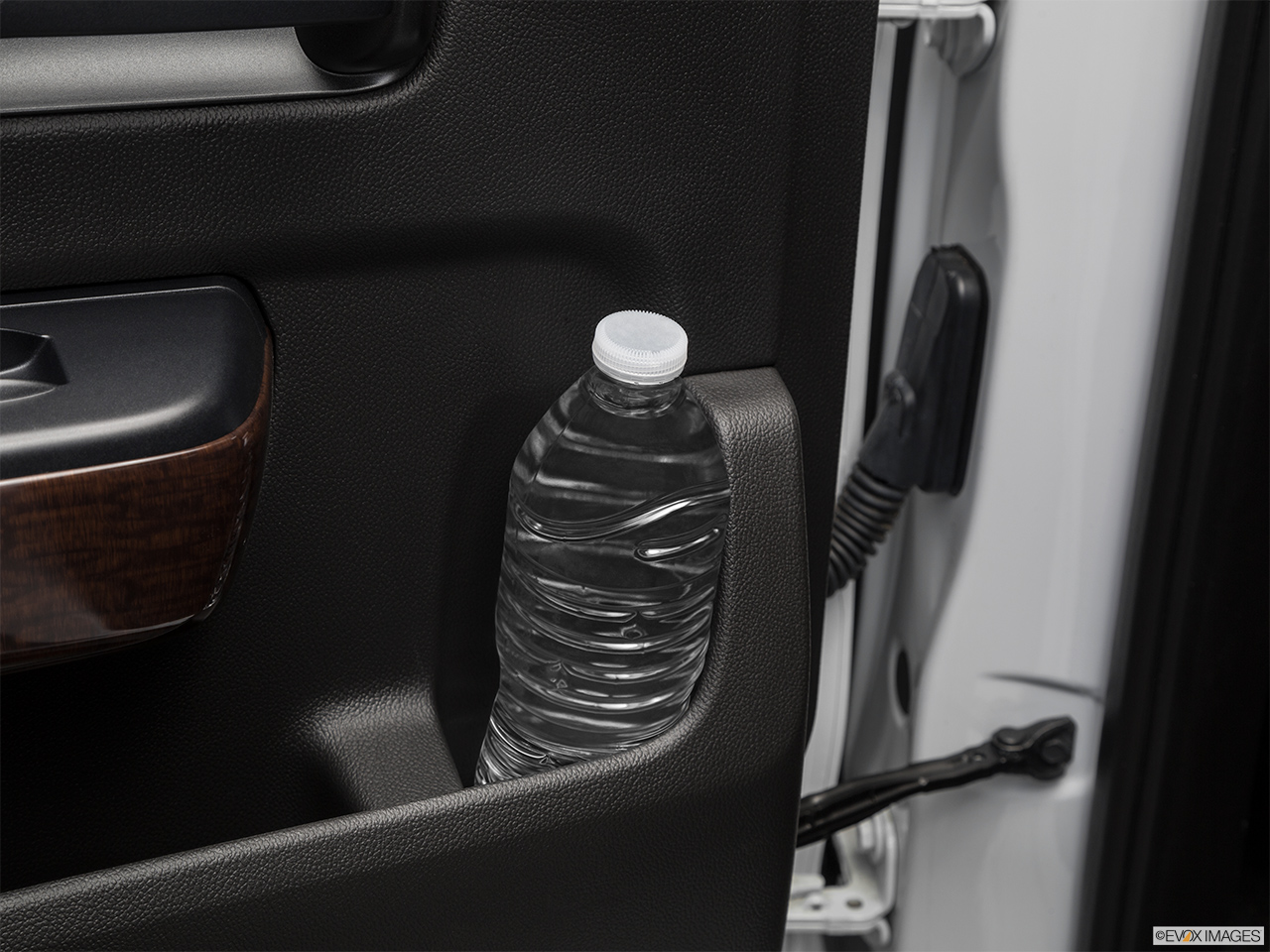 2019 GMC Sierra 2500HD SLT Second row side cup holder with coffee prop, or second row door cup holder with water bottle. 