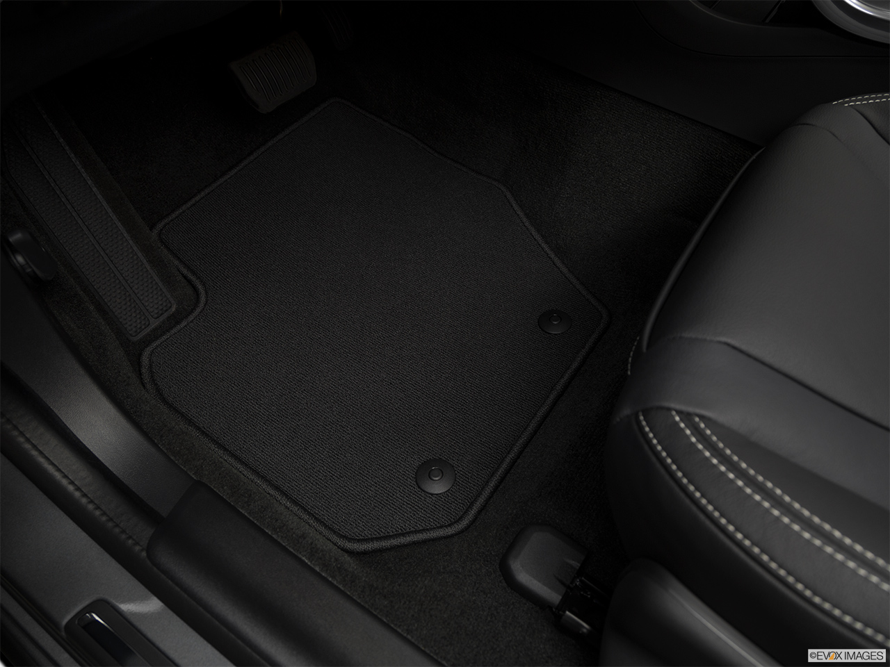 2018 Volvo V60 T5 Dynamic Driver's floor mat and pedals. Mid-seat level from outside looking in. 