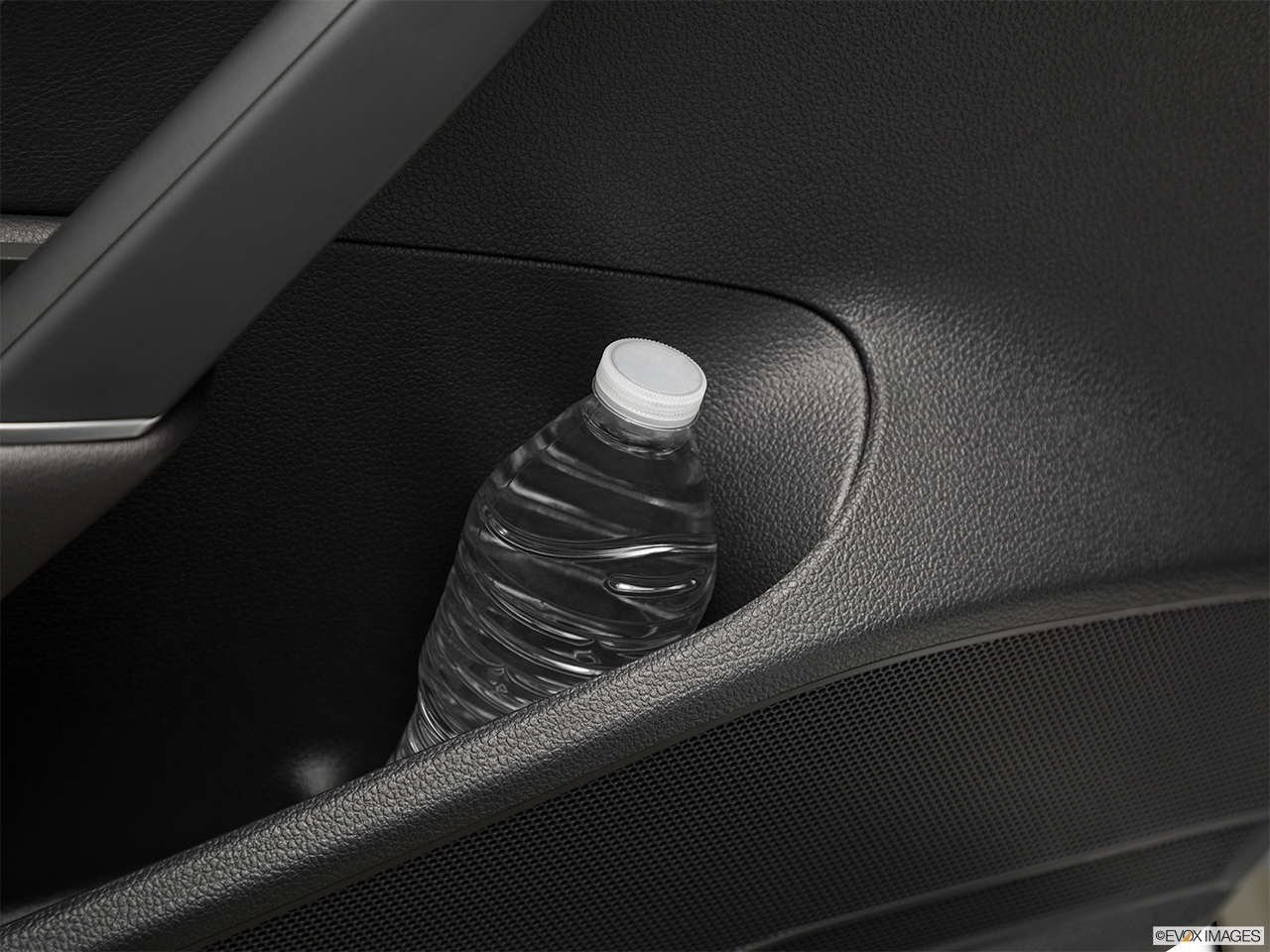 2018 Volkswagen Passat 2.0T SEL Premium Second row side cup holder with coffee prop, or second row door cup holder with water bottle. 