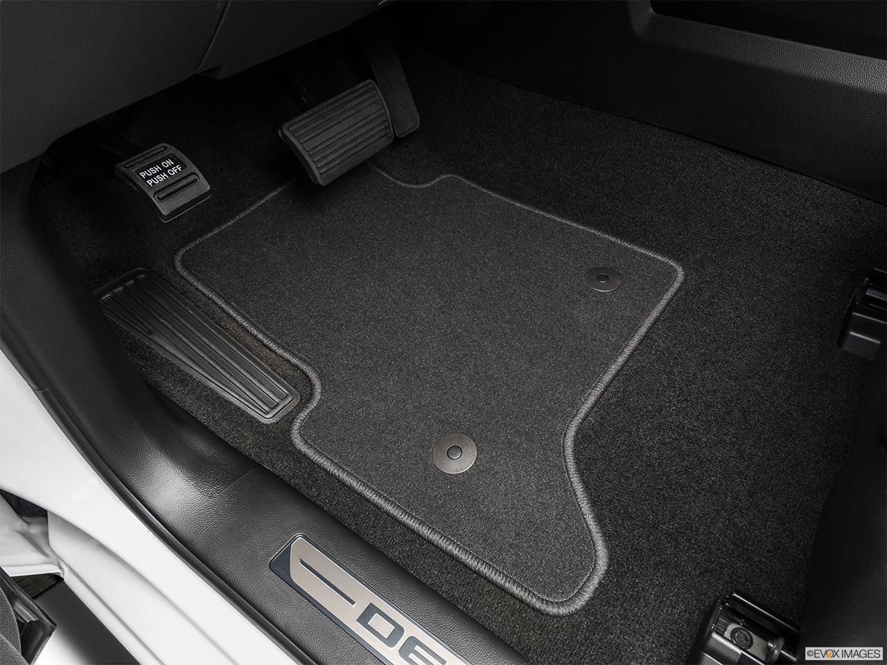 2019 GMC Sierra 2500HD Denali Driver's floor mat and pedals. Mid-seat level from outside looking in. 