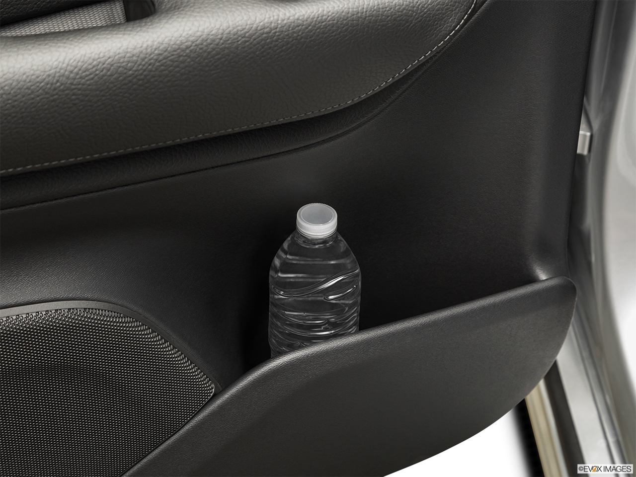 2019 Volvo XC90  T6 Momentum Second row side cup holder with coffee prop, or second row door cup holder with water bottle. 