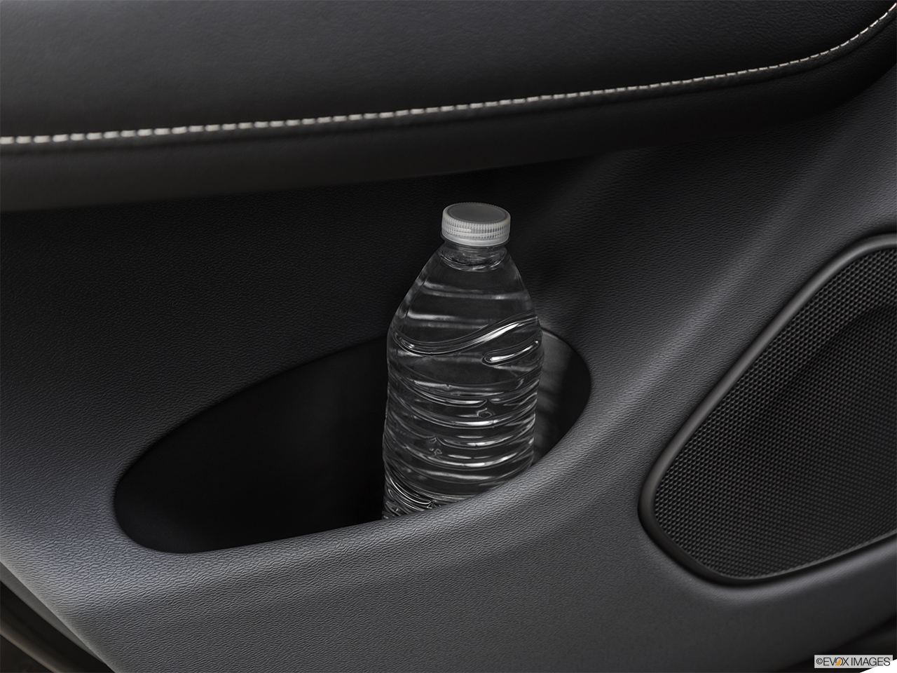 2019 Volvo XC60 T8 R-Design eAWD Plug-in Hybrid Second row side cup holder with coffee prop, or second row door cup holder with water bottle. 