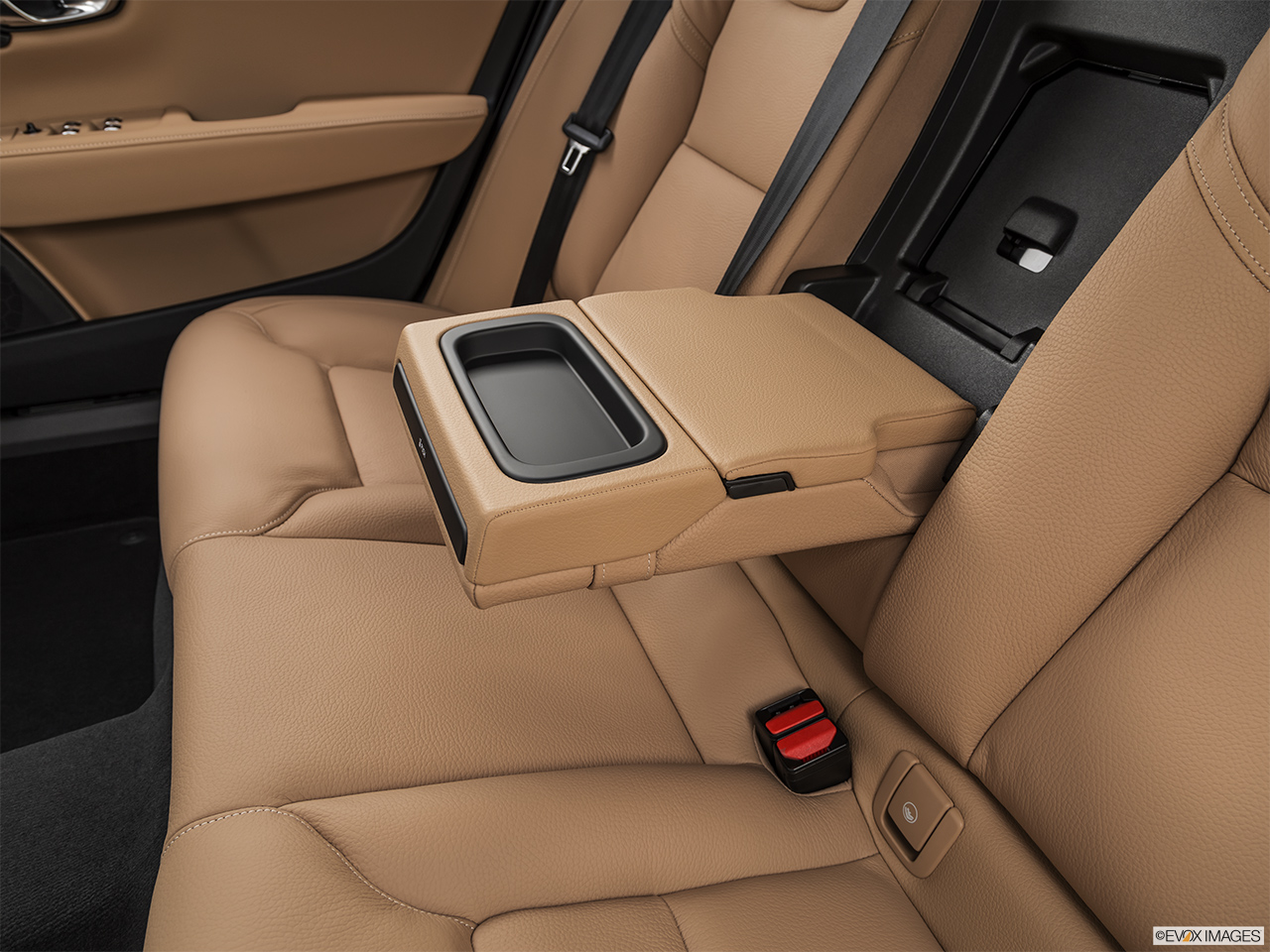 2019 Volvo S90 T5 Momentum Rear center console with closed lid from driver's side looking down. 
