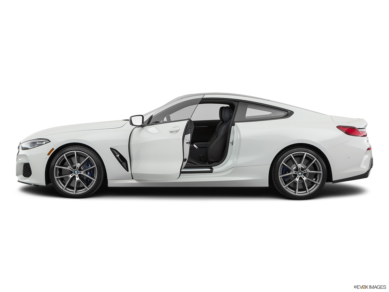 2019 BMW 8-series M850i xDrive Driver's side profile with drivers side door open. 