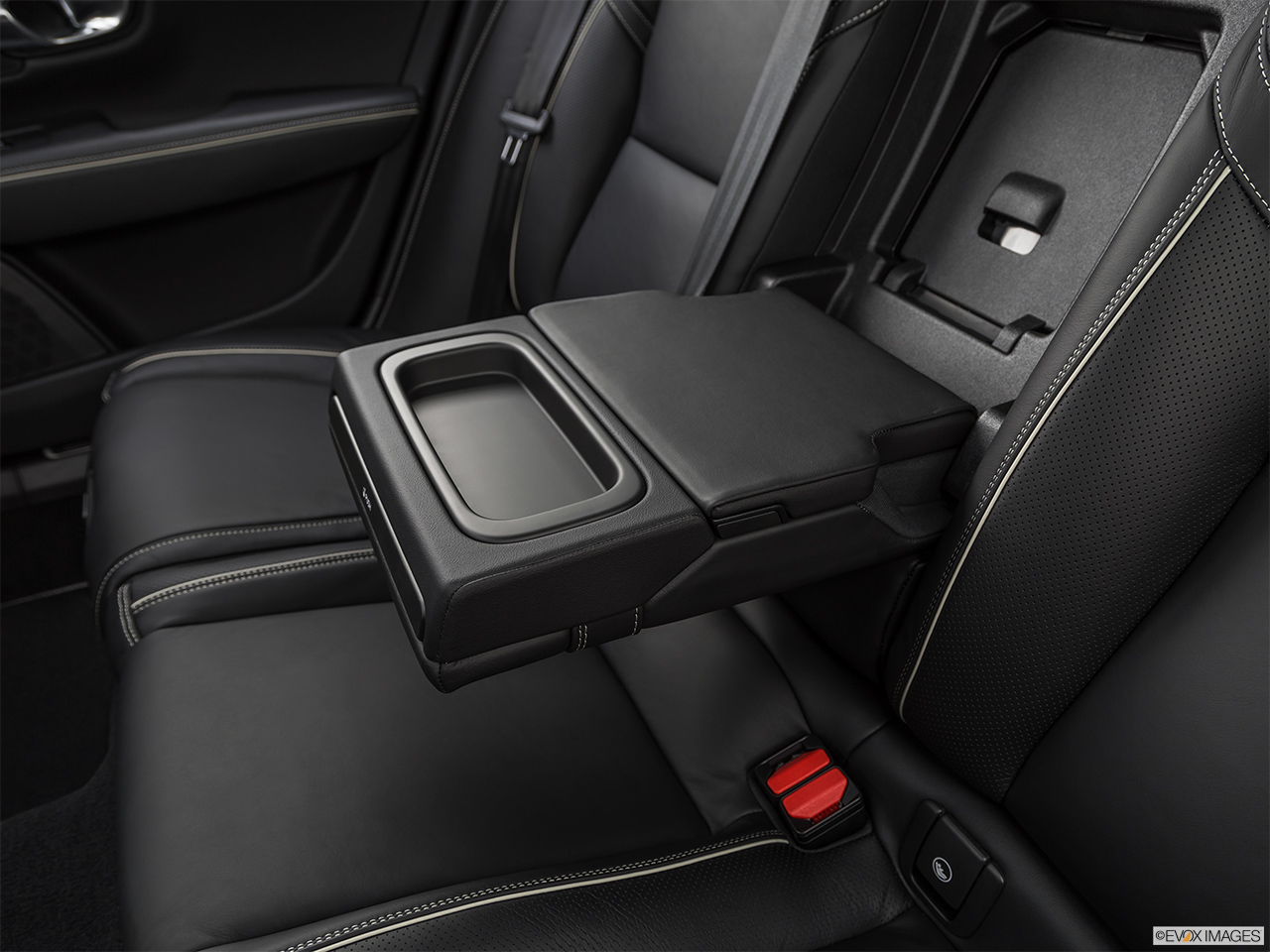 2019 Volvo V90 T5 R-Design Rear center console with closed lid from driver's side looking down. 