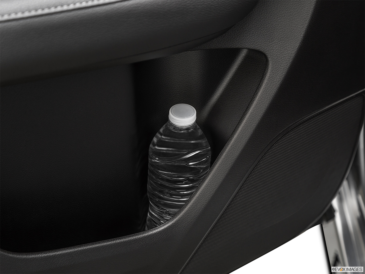 2020 Acura MDX Base Second row side cup holder with coffee prop, or second row door cup holder with water bottle. 