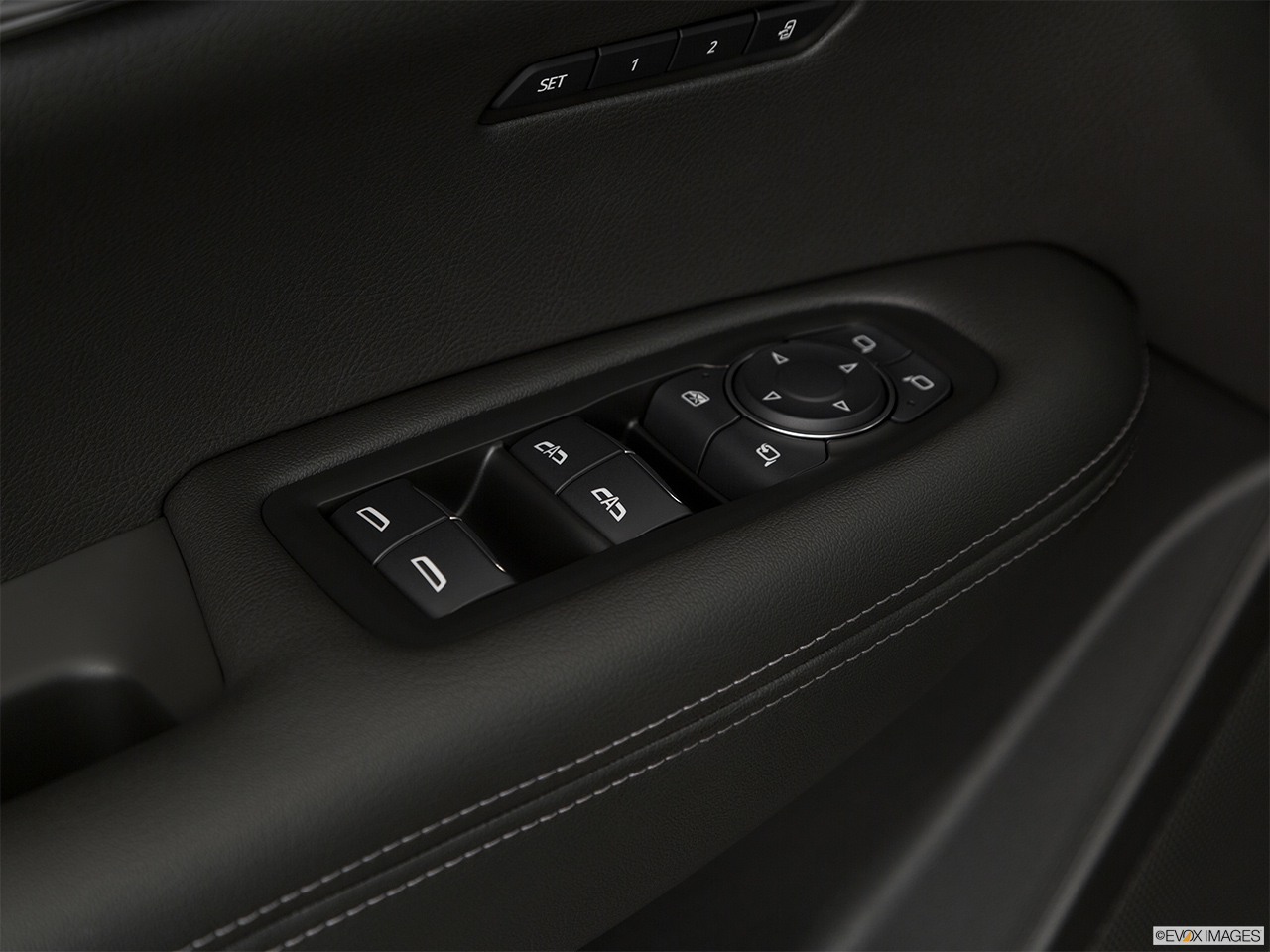 2020 Cadillac XT6 Premium Luxury Driver's side inside window controls. 