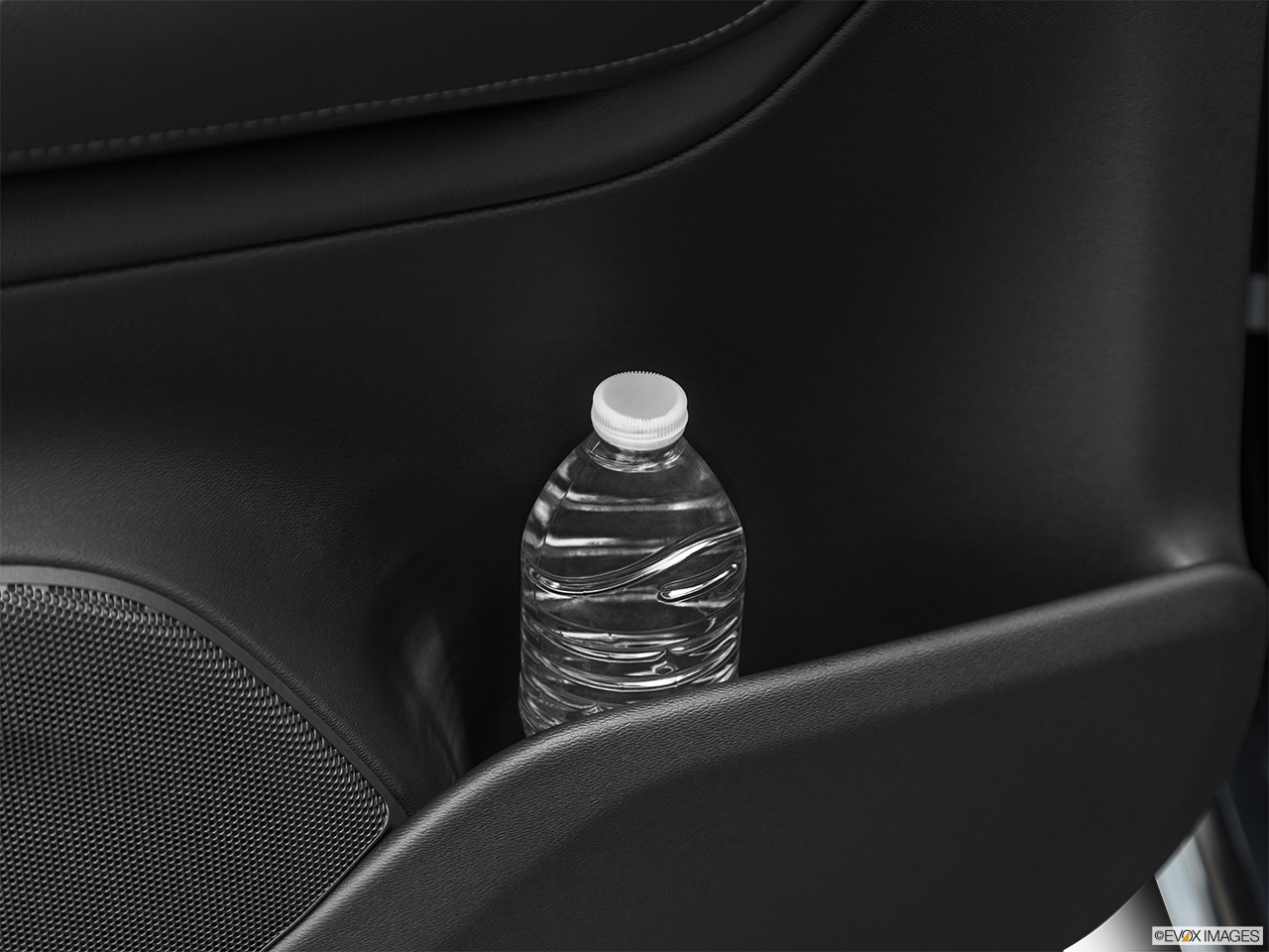 2020 Volvo XC90 T5 Momentum Second row side cup holder with coffee prop, or second row door cup holder with water bottle. 