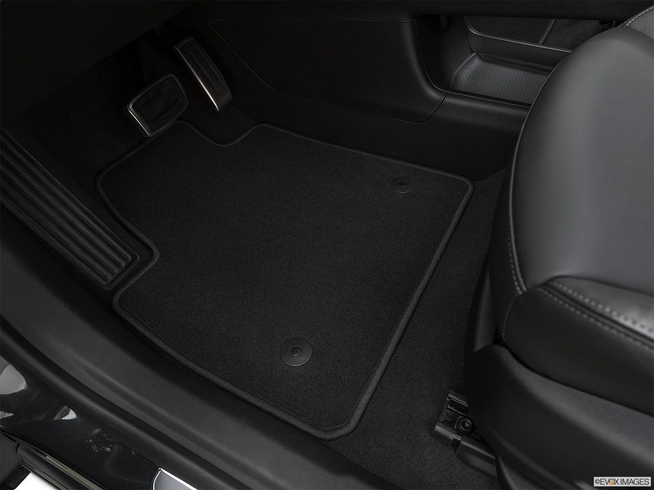 2020 Cadillac XT6 Sport Driver's floor mat and pedals. Mid-seat level from outside looking in. 