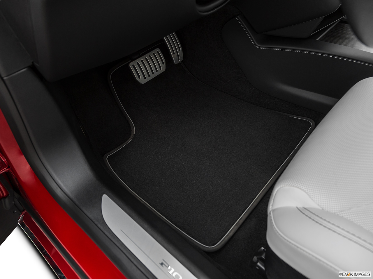 2019 Tesla Model S P100D Driver's floor mat and pedals. Mid-seat level from outside looking in. 