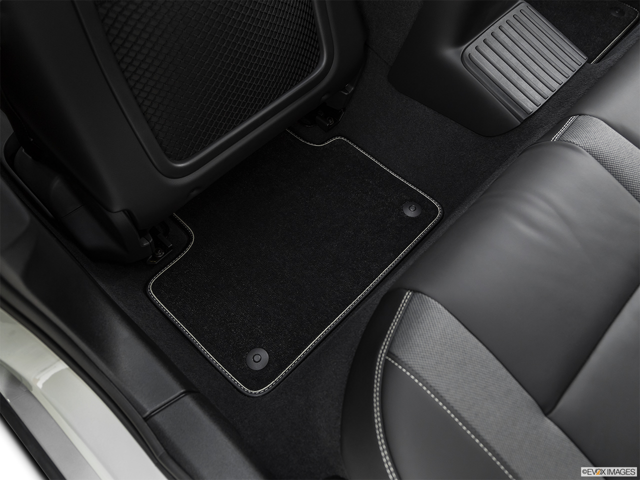 2020 Volvo S60 T8 R-Design eAWD Plug-in Hybrid Rear driver's side floor mat. Mid-seat level from outside looking in. 