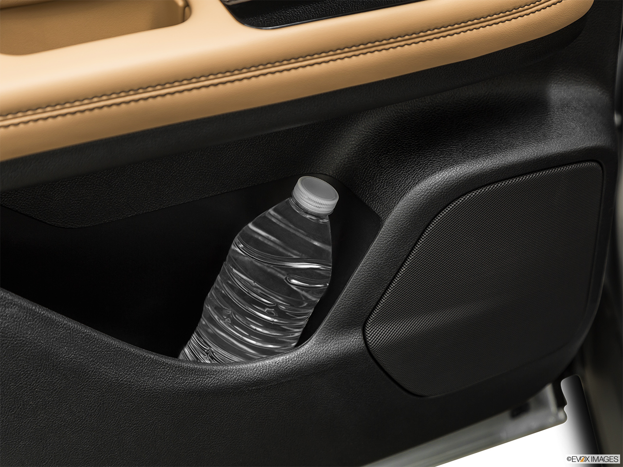 2020 Lincoln Corsair Reserve Second row side cup holder with coffee prop, or second row door cup holder with water bottle. 