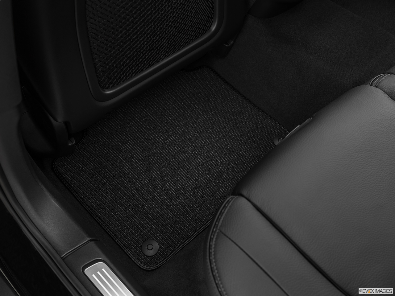 2020 Volvo V90 Cross Country T6 AWD Rear driver's side floor mat. Mid-seat level from outside looking in. 