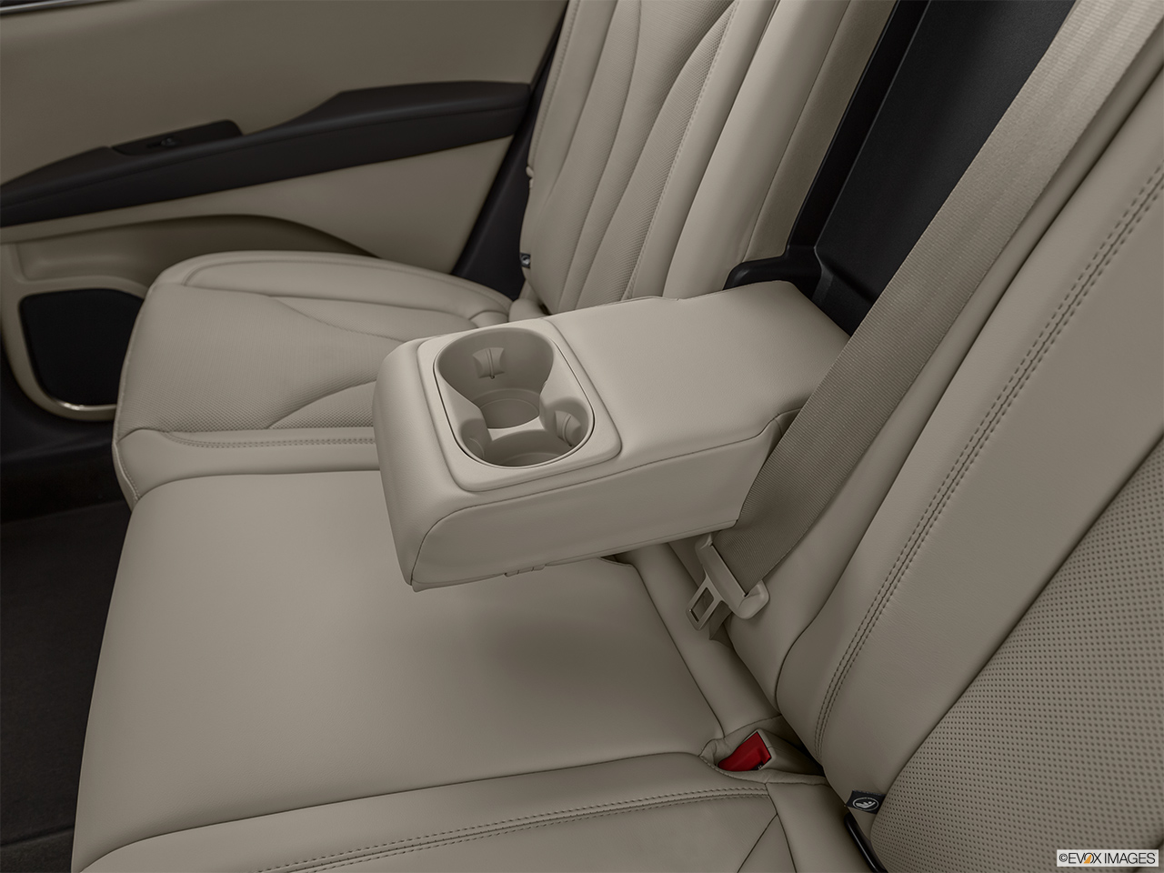 2020 Lincoln Nautilus Reserve Rear center console with closed lid from driver's side looking down. 