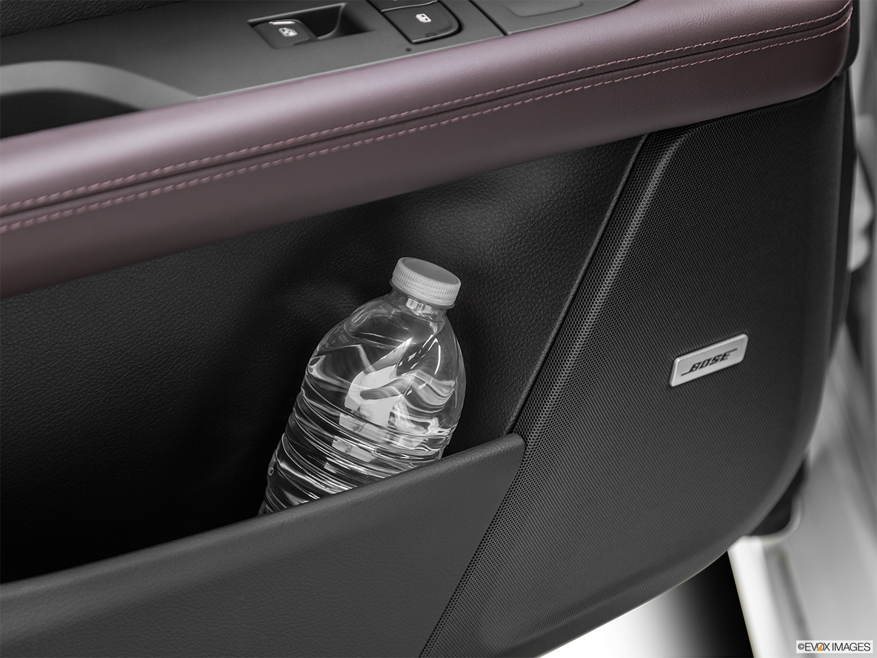 2019 Cadillac CT6-V Base Second row side cup holder with coffee prop, or second row door cup holder with water bottle. 