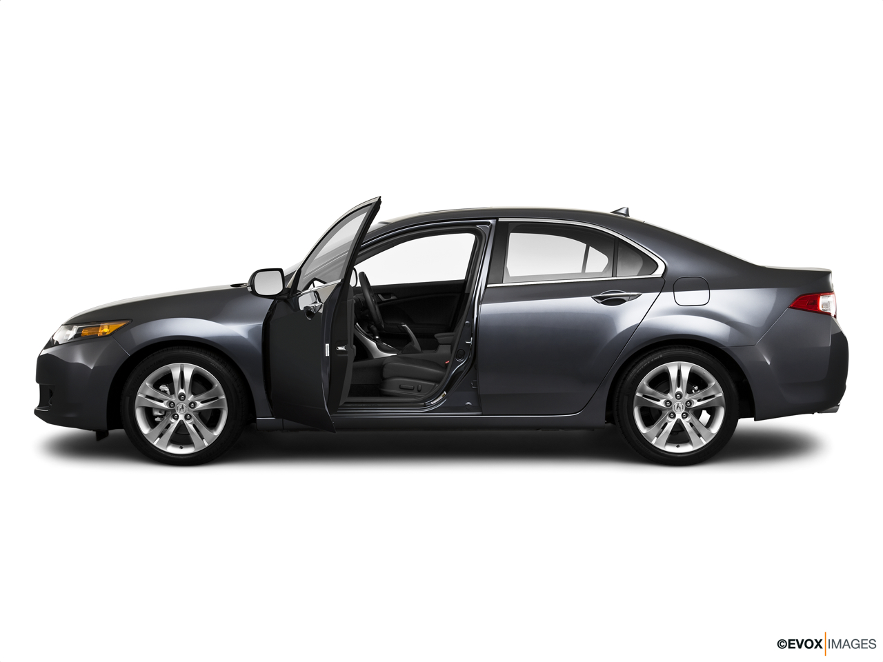 2010 Acura TSX V6 Driver's side profile with drivers side door open. 